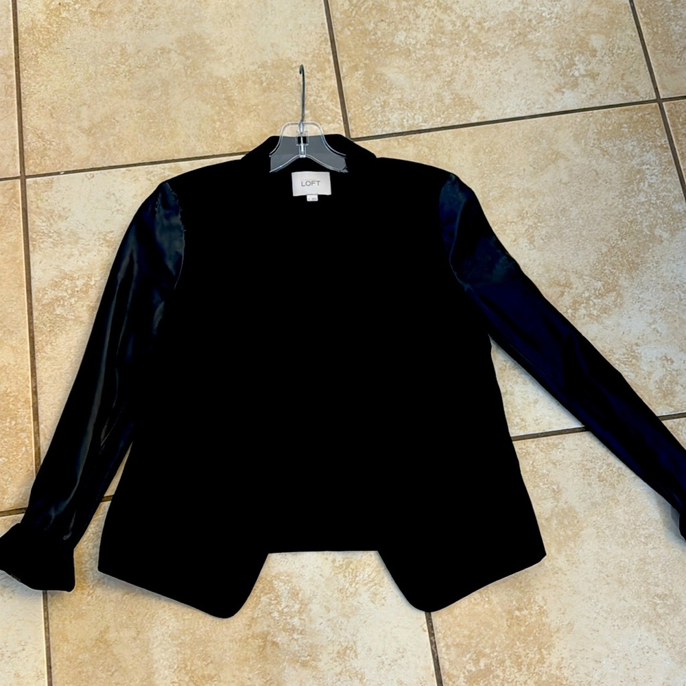 Jacket with faux leather sleeves